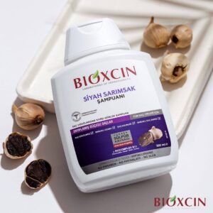 شامپو ضد ریزش و تقویت کننده مو حاوی عصاره سیر سیاه بیوکسین